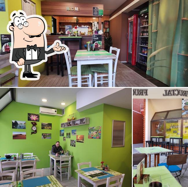 Dai un'occhiata agli interni di Wok & Roll Celje