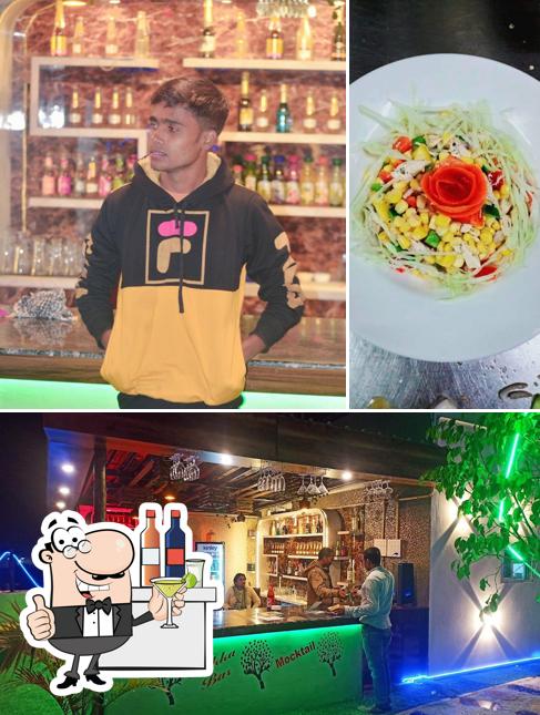 The photo of bar counter and food at The Sky Garden Restaurant