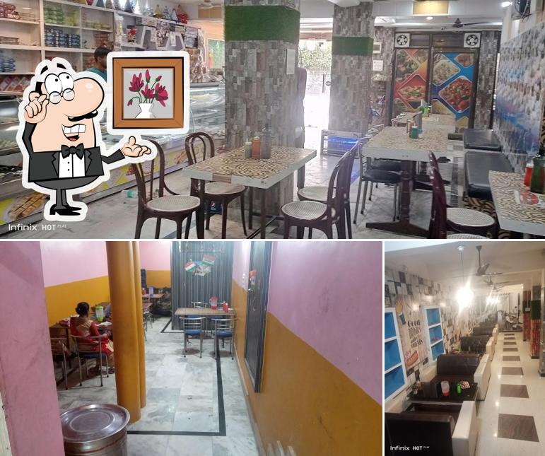 The interior of KAMDHENU sweet mart & Restaurants