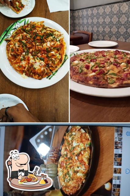 At Pizza Holic Woodfire Pizza, you can get pizza