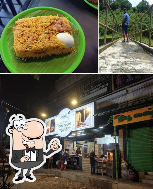 Take a look at the image depicting exterior and food at ALTHAF FOOD COURT