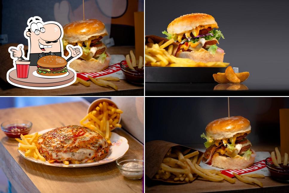 Order a burger at Cafe de den