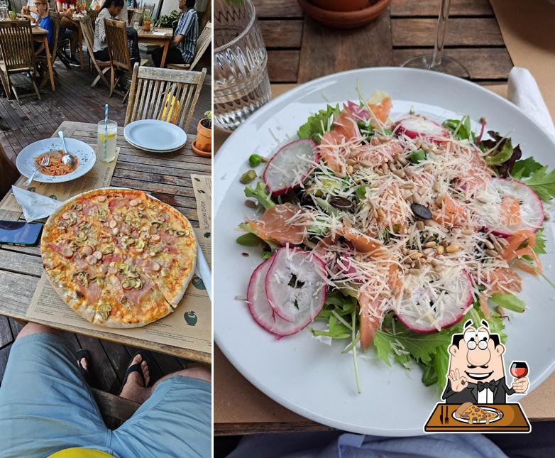 Prenditi una pizza a Gostilna, pizzeria, okrepčevalnica in delikatesa ljubljanski Dvor Ivan Kapetanović s.p