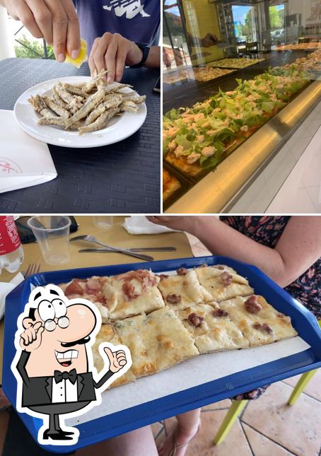 Tra le diverse cose da VOGLIA DI PIZZA - Rosticceria - Tavola Calda si possono trovare la interni e cibo