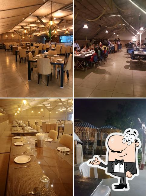 The interior of Sanjha Chulha Garden Restaurant