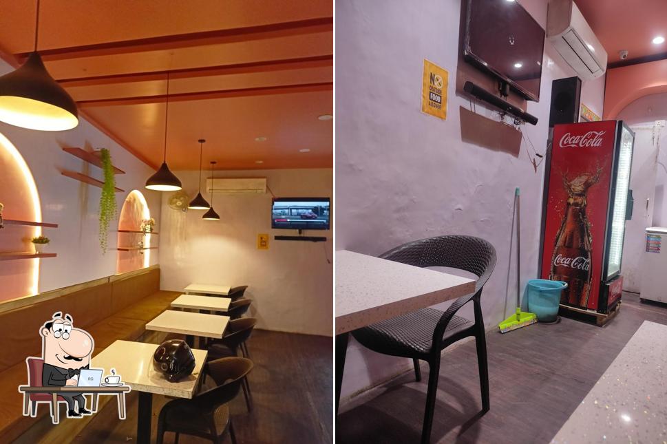 Take a seat at one of the tables at The Cafe Station