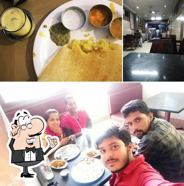Take a look at the image displaying interior and food at Aaryas Restaurant