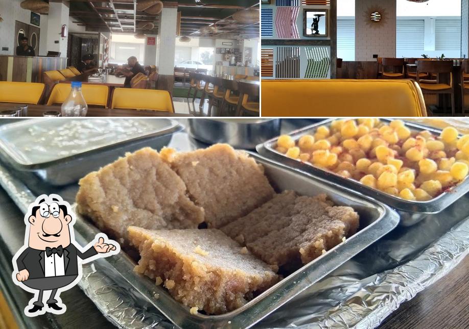 Among different things one can find interior and food at Shree Khodiyar Kathiyavadi Dhaba, Vyara
