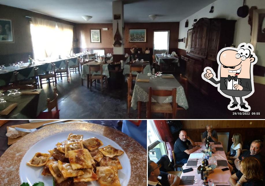 Questa è la foto che mostra la interni e cibo di Locanda Il Fungo