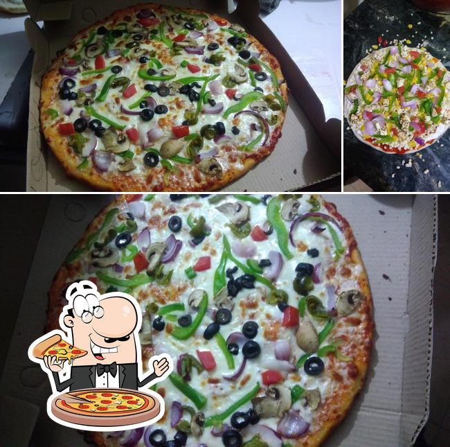 Try out pizza at Pizza House