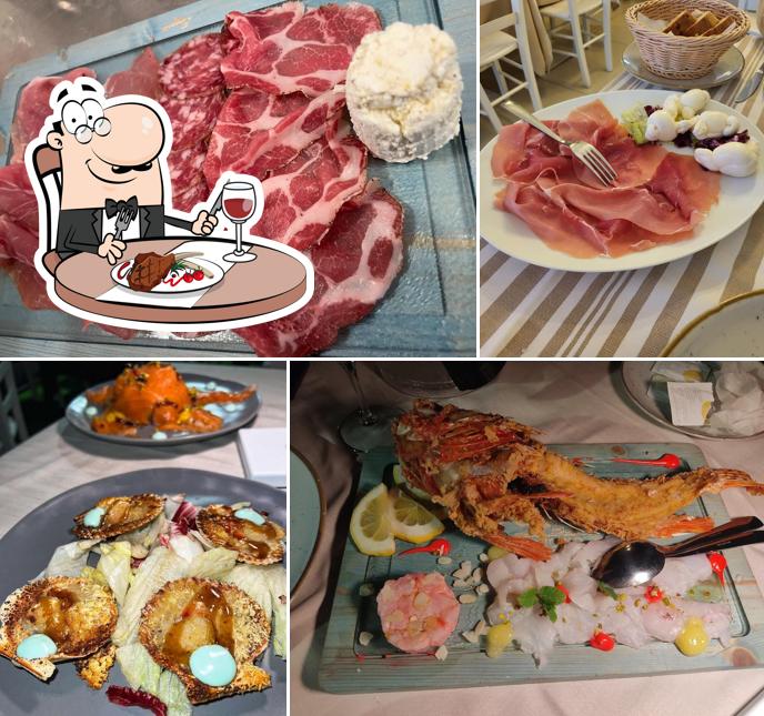 Prenditi i un pasto a base di carne a Bola sul mare