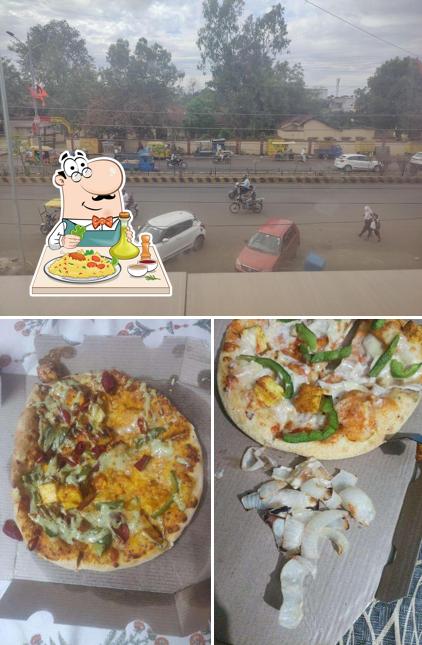 This is the picture depicting food and exterior at Domino's Pizza Anand Nagar, Jabalpur