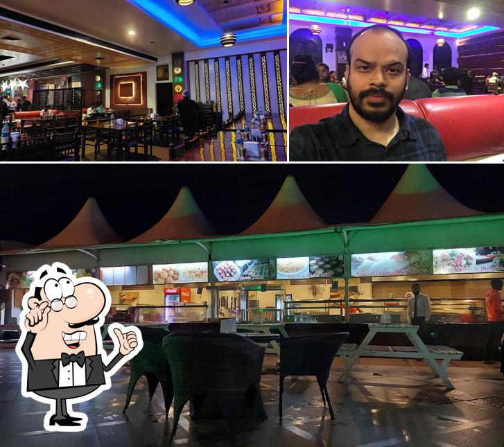 Take a seat at one of the tables at Mannat Haveli Murthal