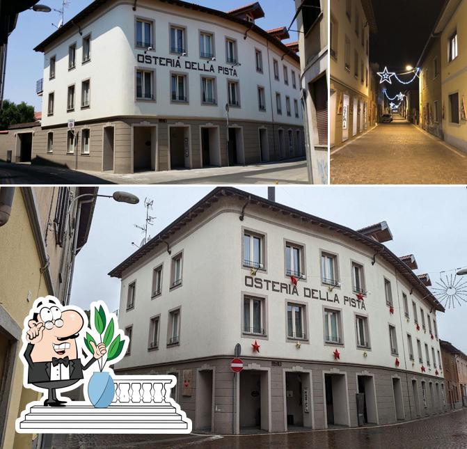 Puoi goderti l'aria fresca da seduto all'esterno di Hotel Osteria della Pista