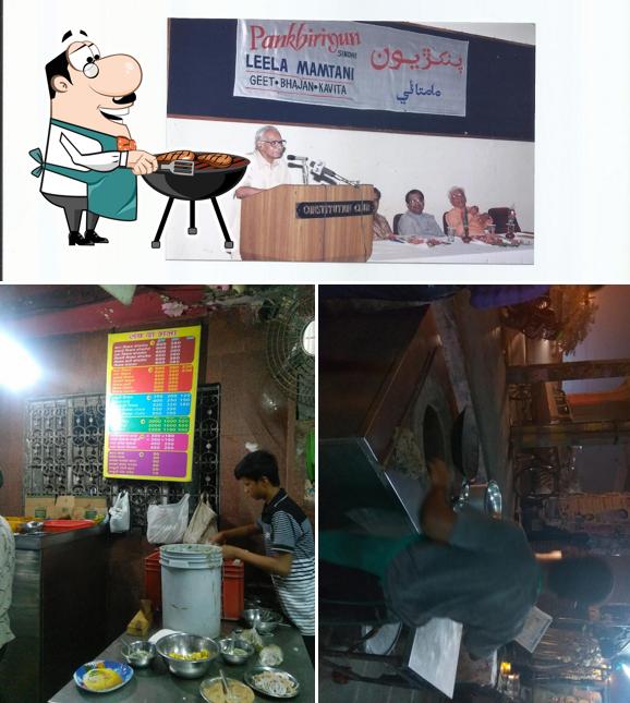 Look at the picture of Singh Chicken place