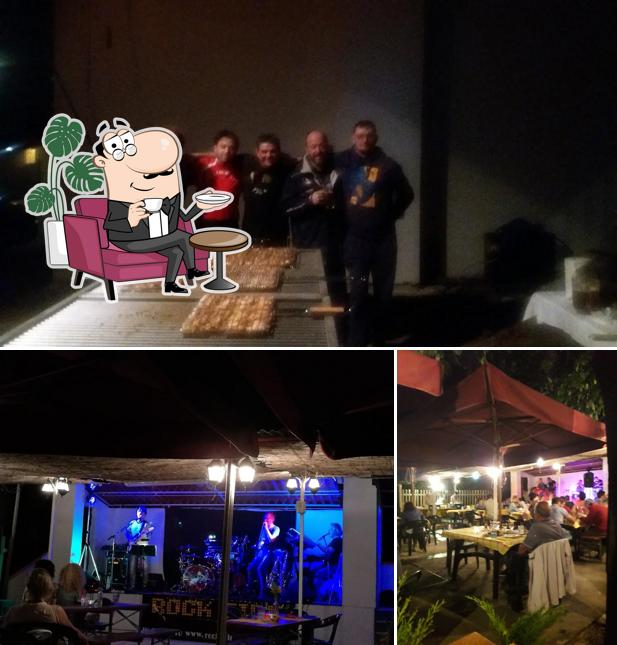 Siediti a un tavolo di Trattoria al Cacciatore
