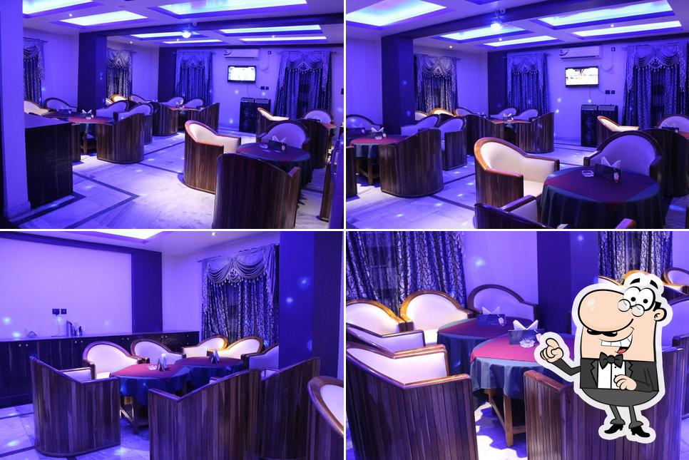 Take a seat at one of the tables at Mehfil Bar