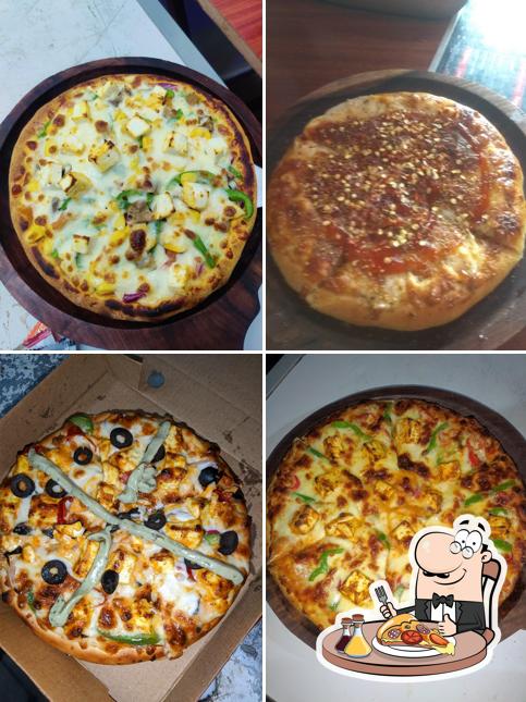 Get pizza at Pizza D Queen