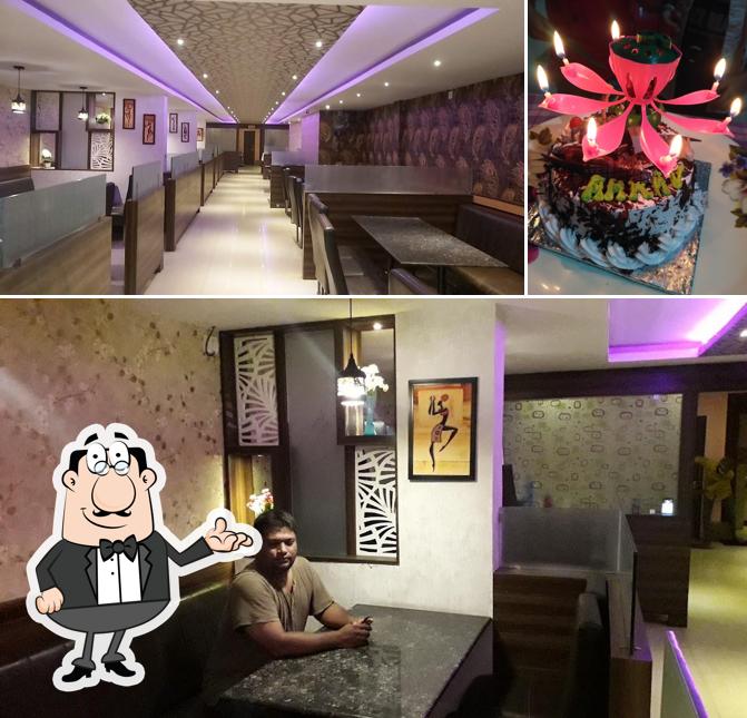 The photo of interior and cake at New Balaji DHABA SUNCITY BANDLA GUDA