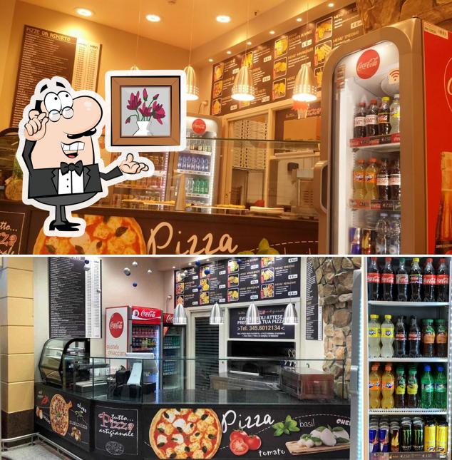 Dai un'occhiata agli interni di Tutto Pizza Artigianale