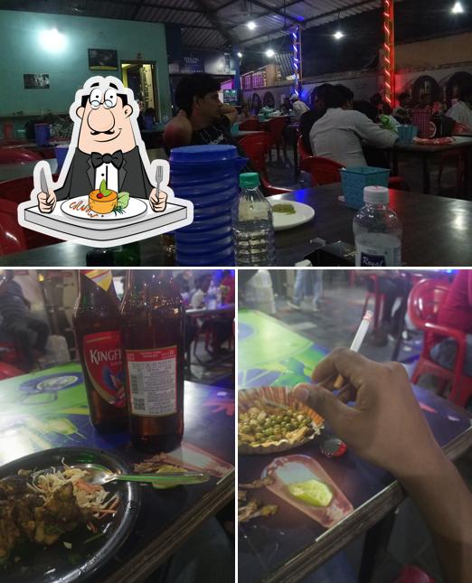 Among various things one can find food and interior at Golden Bar & Restaurant