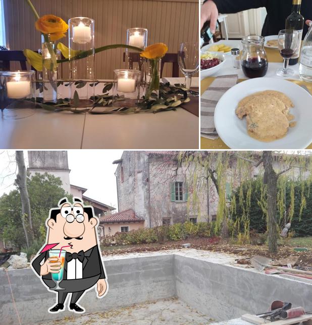 Questa è la foto che mostra la bevanda e esterno di Trattoria Due Chiavi Di Nicolini Gino