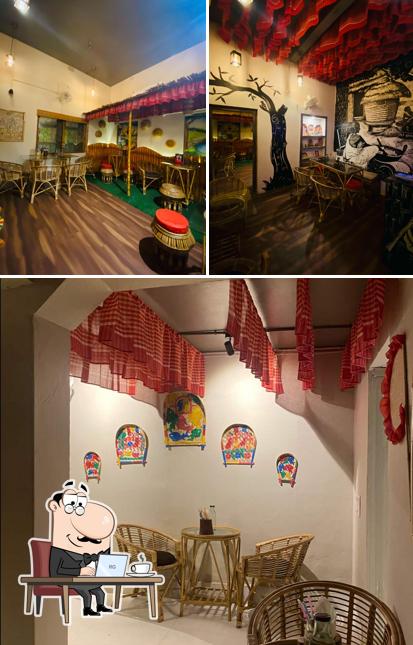 Take a seat at one of the tables at Goppo Hut Cafe