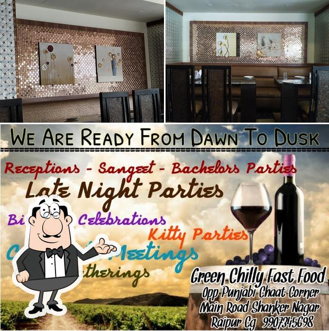 This is the image depicting interior and wine at Green Chilly Fast Food