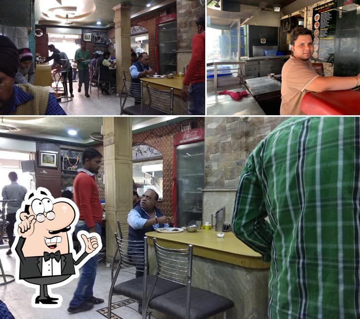 Take a seat at one of the tables at Chacha Gyan Ka Dhaba