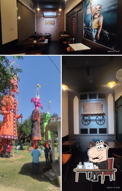 Take a seat at one of the tables at Chai Ho Jaye - Open 24/7