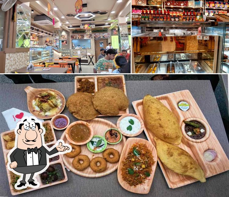 Take a seat at one of the tables at Bikaner Express