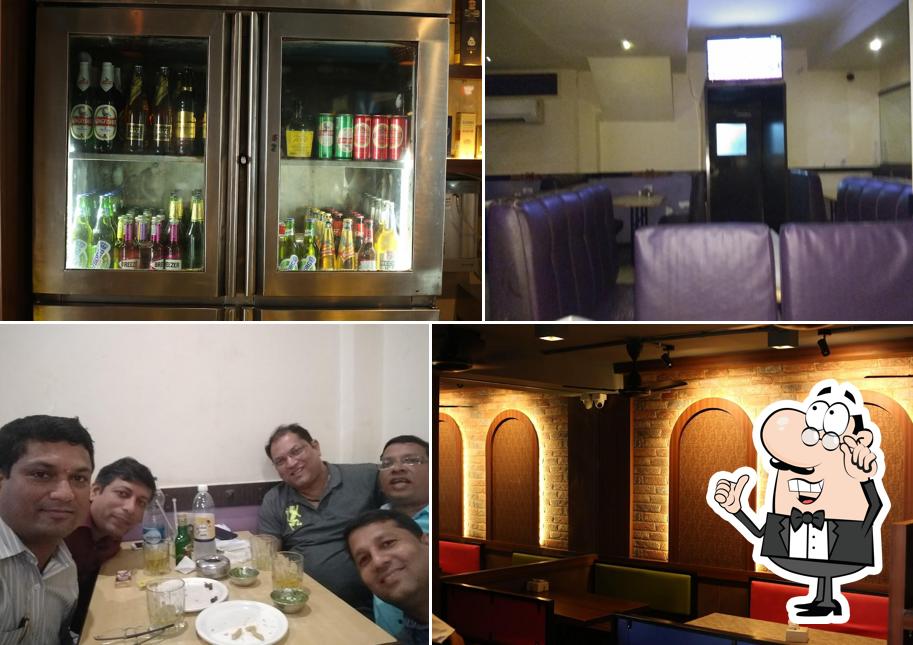 Take a seat at one of the tables at Deepa Dining Bar