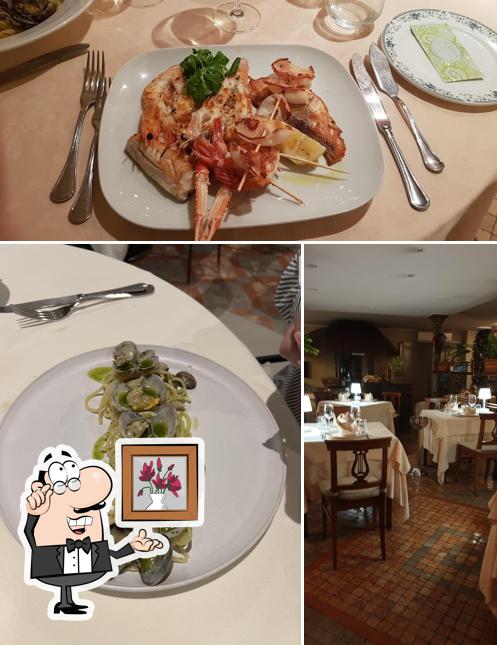 La immagine della interni e cibo di Er Piu