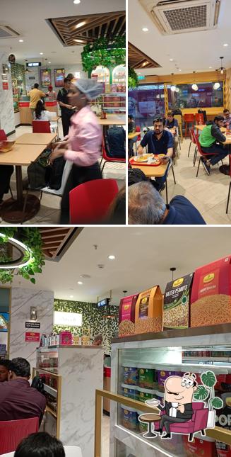 Take a seat at one of the tables at Haldiram's
