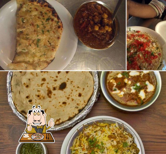 Get pizza at Lovely Restaurant