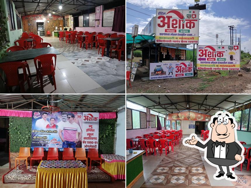 Take a seat at one of the tables at Hotel Ashok