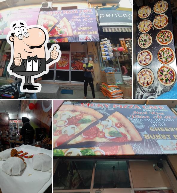 Look at the photo of Vicky pizza cafe