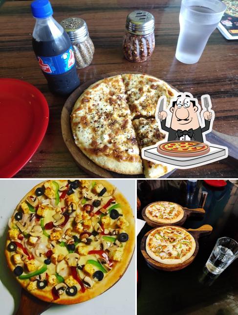 Try out pizza at Tasty Pizza Paradise "Cafe & Restaurant ''