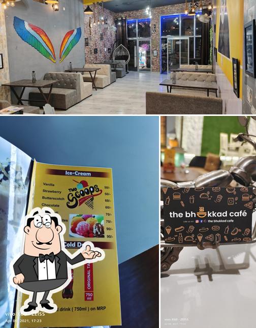 Take a seat at one of the tables at The Bhukkad Cafe