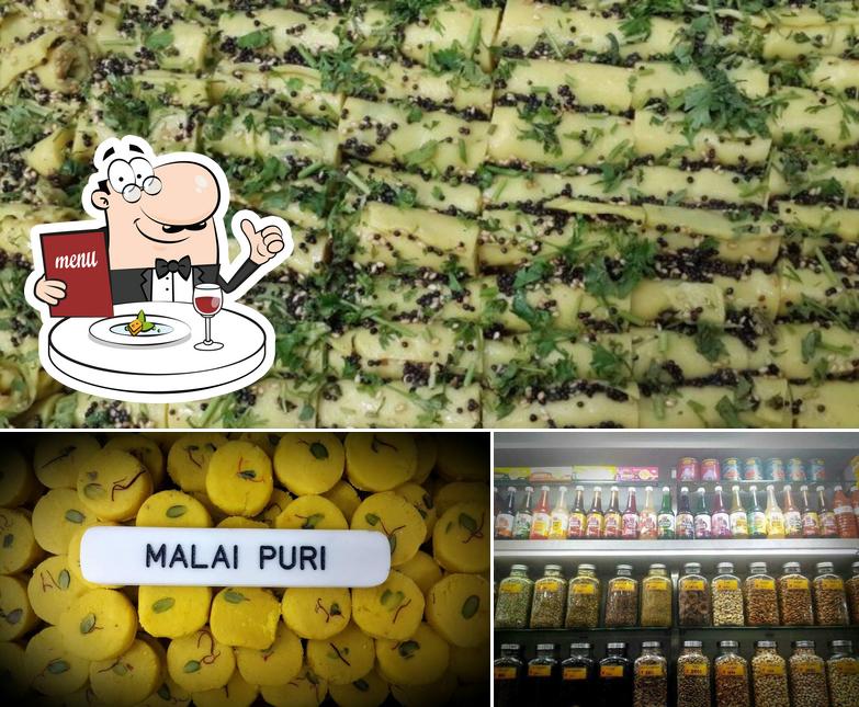Check out the photo depicting food and beer at Annapurna Farsan Mart