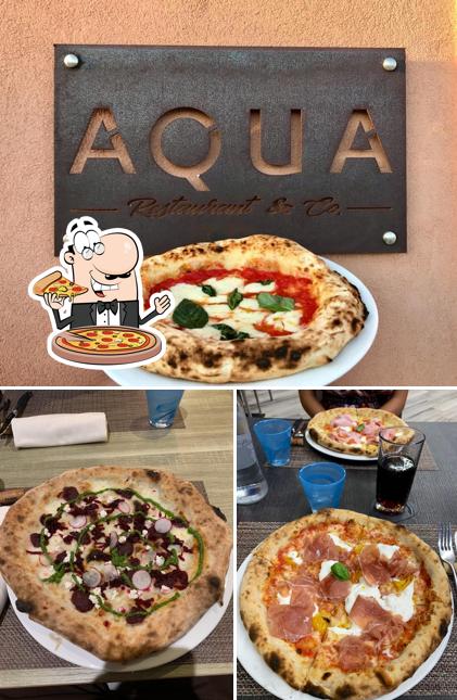 Prenditi una pizza a Aqua