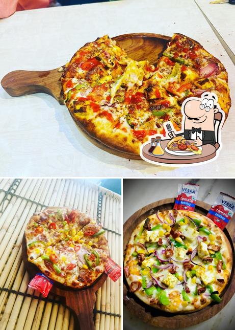 Get pizza at Good vibes cafe