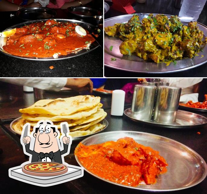 Try out pizza at Faanoos Dhaba