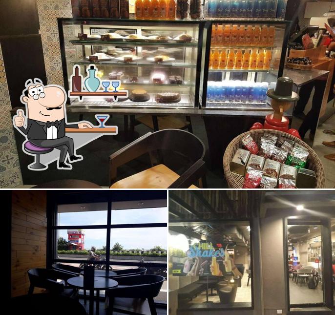 Take a seat at one of the tables at Cafe Coffee Day