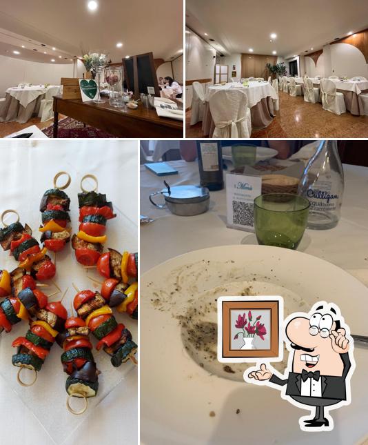 La immagine di interni e cibo da Ristorante il mangiarino