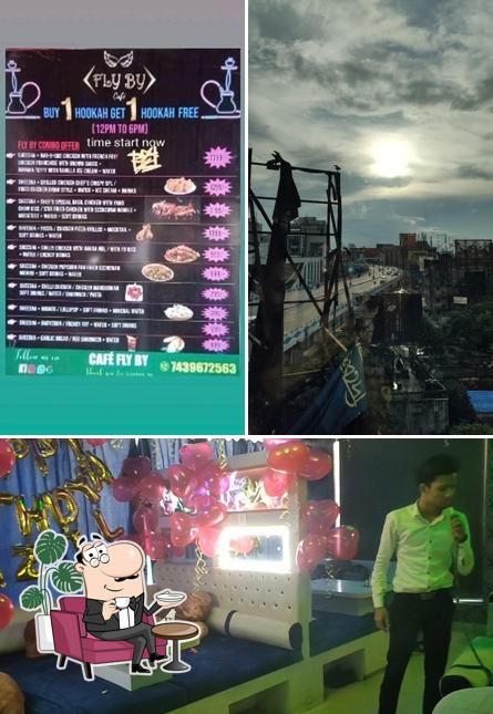 Take a seat at one of the tables at Cafe Flyby