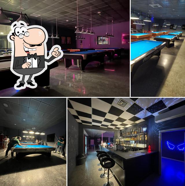 Siediti a un tavolo di Pep's Billiard Club