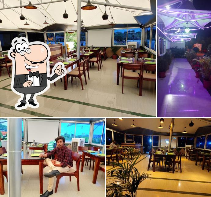 The interior of Green Wood A/C Restaurant and Suites