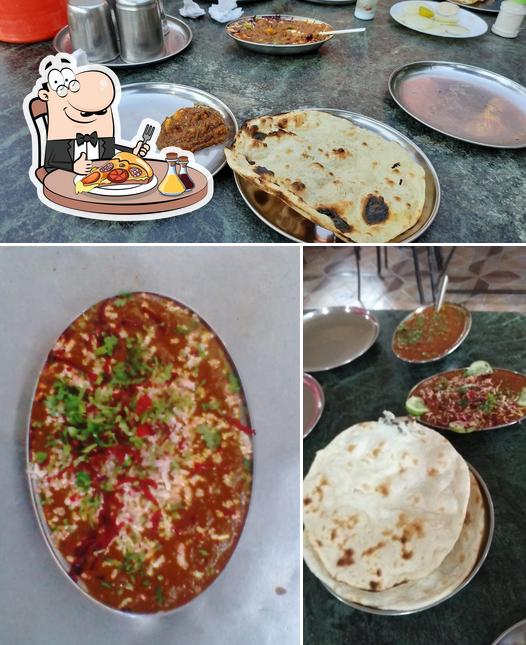 Get pizza at Hotel New Ganesh Thakur Dhaba