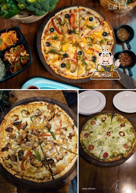 Get pizza at Tall Tales